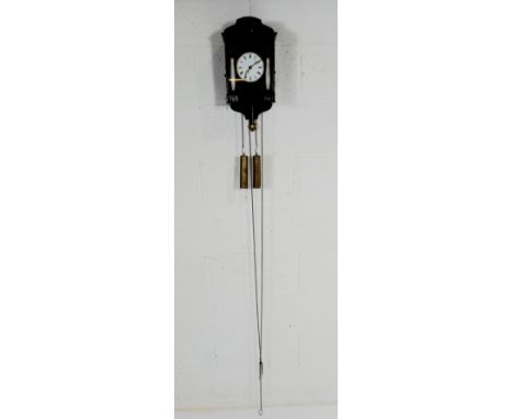 A vintage Beha cuckoo clock with ebonised case with gilt highlights, and ceramic pillar details