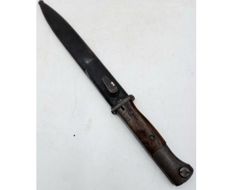 A World War 2 Bayonet and scabbard.