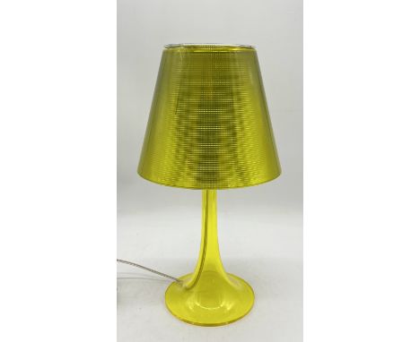 A Flos lime green table lamp designed by Philippe Starck in the Miss-K design - 44cm tall