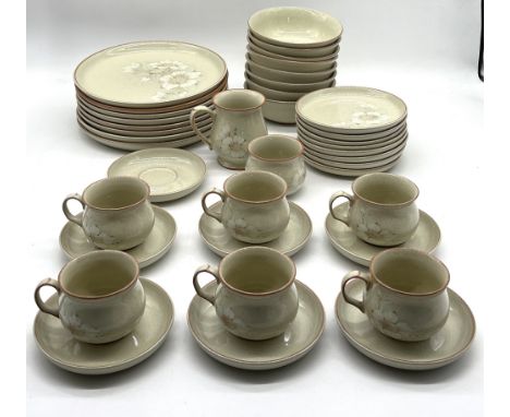 A Denby "Daybreak" part dinner set including plated, bowls, cups, saucers etc.