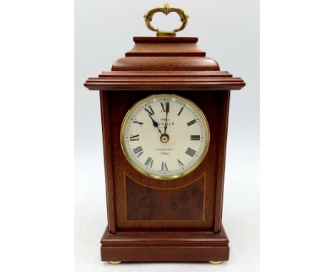A vintage mahogany cased Sewills of Liverpool chiming mantle clock, 15cm wide, 26cm high.