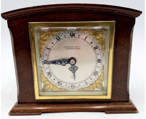 A Vintage mahogany cased mantle clock, named to WM Burford & Son Ltd Eastbourne and Exeter, on bracket feet, 17cm wide 14.5cm