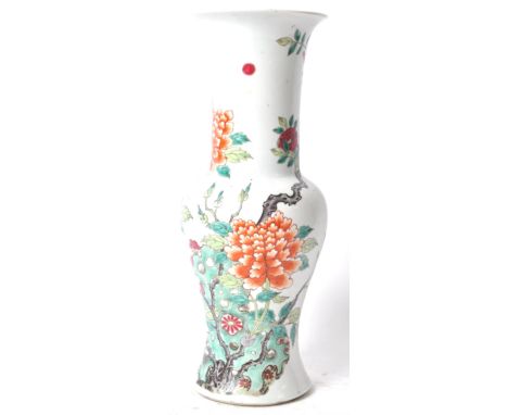 A 19th Century Chinese antique porcelain vase having a white enamel ground with hand painted decoration depicting blooming fl