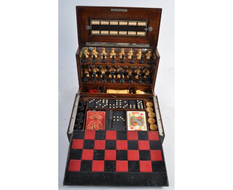 A rare and impressive 19th Century Victorian English antique The Royal Cabinet Of Games games compendium box. This impressive