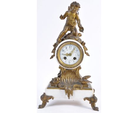 AD Mougin of Paris - A 19th Century French antique white marble and ormolu brass / bronze mantel clock having a cherub figuri