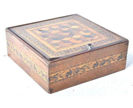 A 19th Century English antique tunbridge ware inlay box of square form having an inlaid geometric design with micro mosaic bo