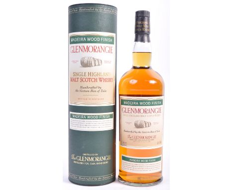 A bottle of Glenmorangie Single Highland Malt Scotch Whisky Madeira Wood Finish. Handcrafted by the Sixteen Men of Tain. 1L 4