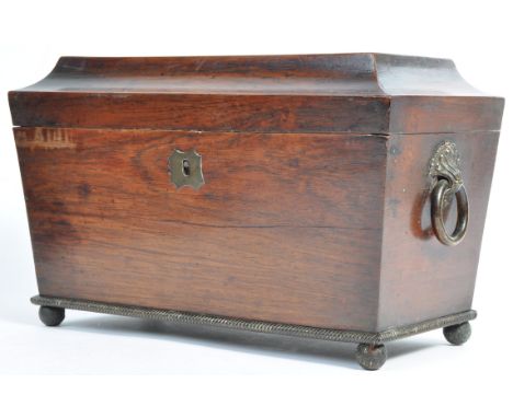 A large 19th Century Georgian&nbsp;Regency English antique rosewood tea caddy of sarcophagus form. The outer case of simple f