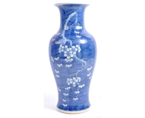 A 19th Century Chinese antique Kangxi mark blue and white porcelain baluster vase hand painted in the prunus pattern with whi