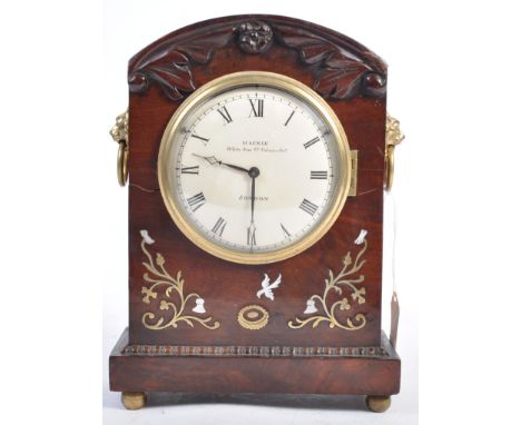 Mackie Of London - A rare 19th Century William IV English antique carved and inlaid mahogany cased mantel clock. The domed wh