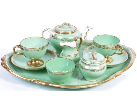 An early - mid 19th Century English Antique fine bone china porcelain Cabaret tea service comprising a large shaped tray with