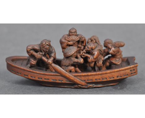 A fine Japanese believed Edo period / 19th century carved wooden signed netsuke. The netsuke in the form of the Treasure boat