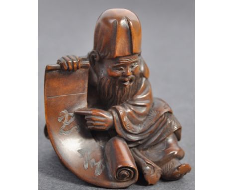 A fine Japanese believed Edo period / 19th century carved wooden signed netsuke. The netsuke in the form of Jurojin - one of 