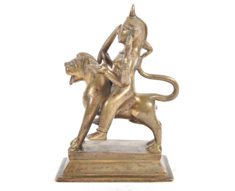 A 19th / early 20th Century Indian Hindu antique bronze / brass figurine believed to depict the Goddess Durga. The four armed