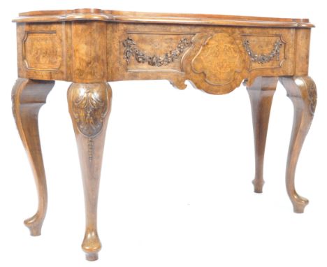 A 19th Century Dutch antique walnut side table / console table / serving table having a stepped carved top with inset side fr