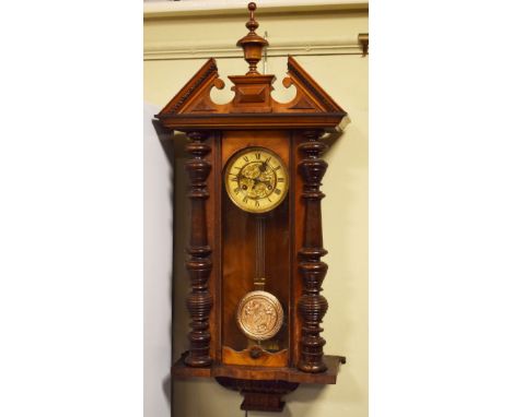 Late 19th Century walnut and beech cased Vienna style wall clock, the dial with Roman numerals   Condition: 