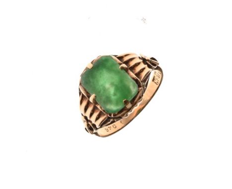 Yellow metal signet ring set jade panel, the shank stamped 18k, size K½, 3.1g approx gross   Condition: 