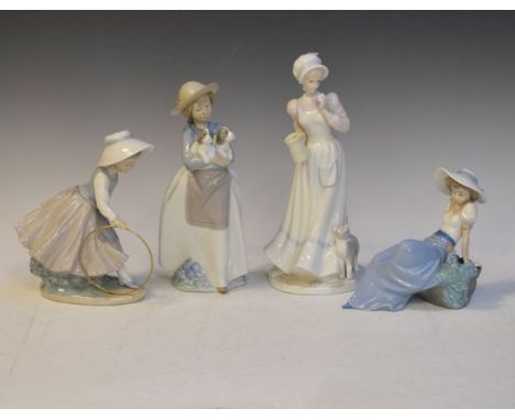 Group of four Nao figures   Condition: 