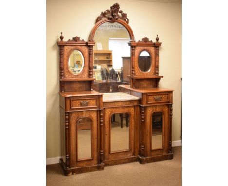 Victorian boxwood inlaid walnut breakfront chiffonier, the raised back with central arch shaped mirror having a carved pedime