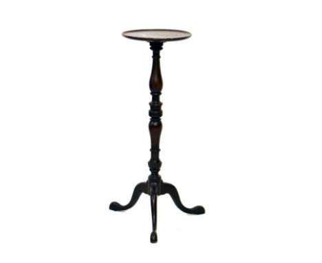 Mahogany and beech circular top torchère standing on a turned pillar and tripod base   Condition: 