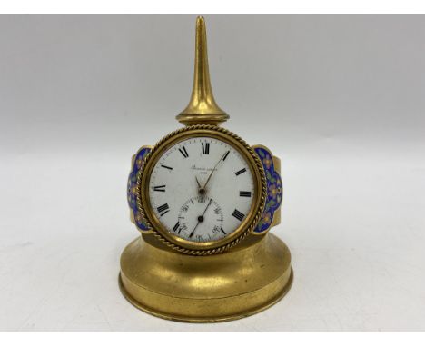 A late 19th century French unusual clock fashioned as a wristwatch, the dial and movement signed 'Barwise London' the case ha
