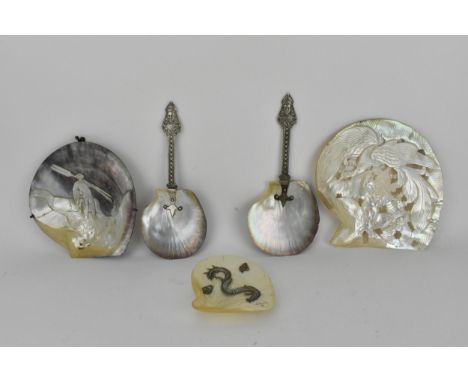 19th and 20th Century mother of pearl comprising of a shell carved with a fisherman carrying oars and a net, signed Aury, 17.