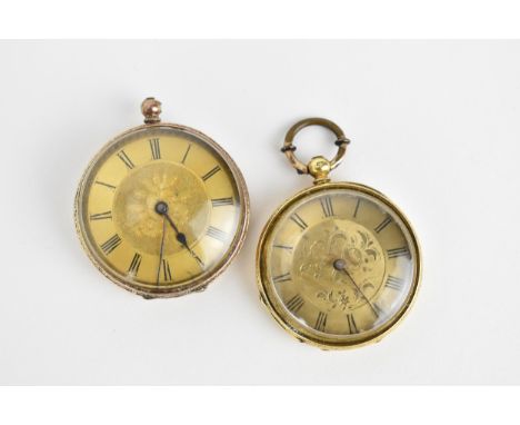 A pair of late 19th/early 20th century key-wound open faced pocket watch to include an engine turned example testing as 14ct,