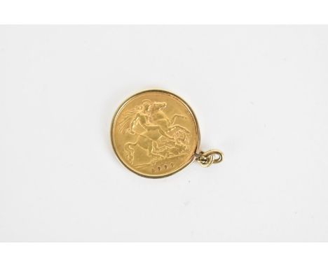 A 1909 London Mint half Sovereign. Uncrowned portrait of King Edward VII to obverse and George and the Dragon to reverse. Set