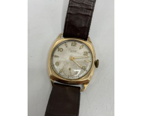 An Everite 1950s gents 9ct gold manual wind wristwatch having a silvered dial with baton and Arabic numerals and subsidiary s