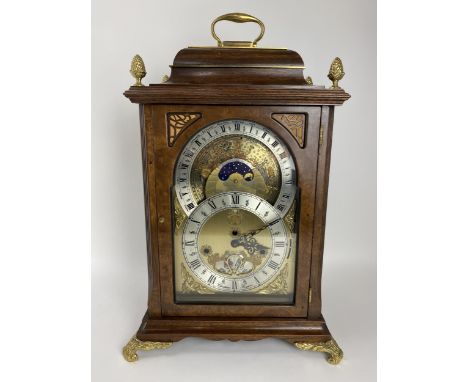 A modern reproduction annual calendar and zodiac indication bracket clock, signed Christiaan Huygens, spring driven movement 
