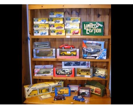 Four shelves of die-cast vehicles - Corgi, Vanguards and Solido, etc. 