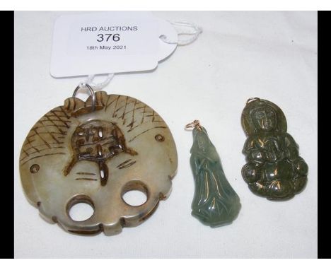 A jade pendant together with two others