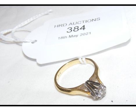 A diamond solitaire ring in 18ct setting