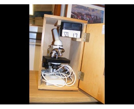 A Lomo Micmed 1 microscope and various lenses - boxed