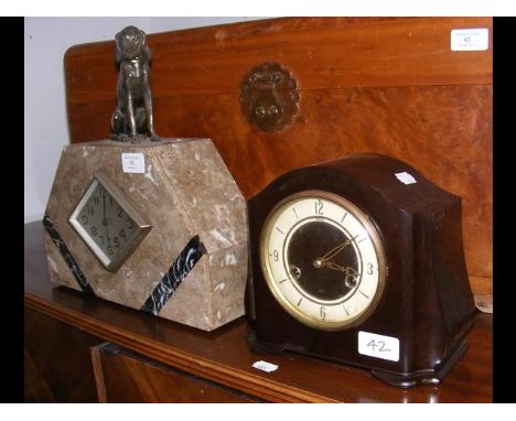 An Art Deco style French mantel clock together with a Bakelite mantel clock