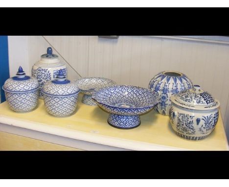 A quantity of oriental style blue and white ceramic ware 