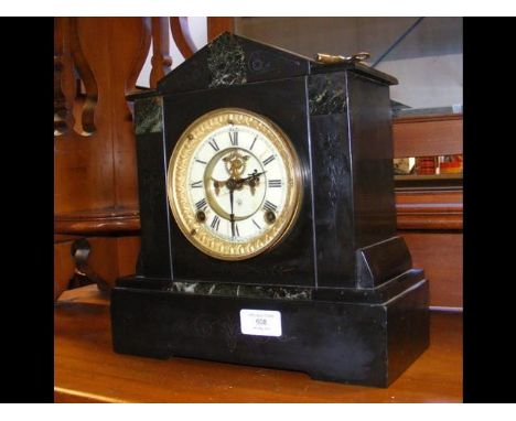 An Ansonia Clock Co. slate and marble mantel clock 