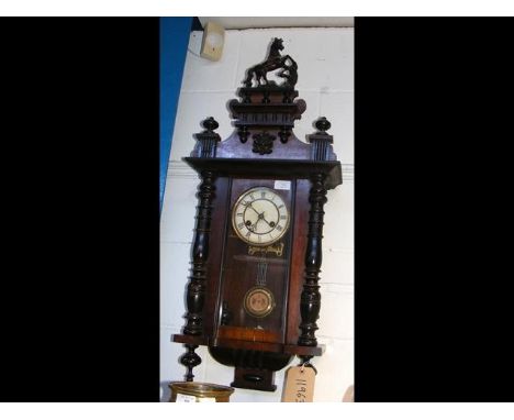 A Vienna regulator wall clock with carved unicorn to crown - circa 1880 