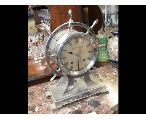 A Pascall Atkey of Cowes chrome nautical ships wheel mantel clock - 40cms highCONDITION REPORTWe have attached a number of ad