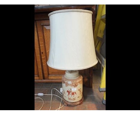 An Oriental style table lamp with shade