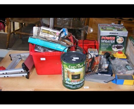 An assembly of hardware including Ronseal power sprayer in box and folding step ladder