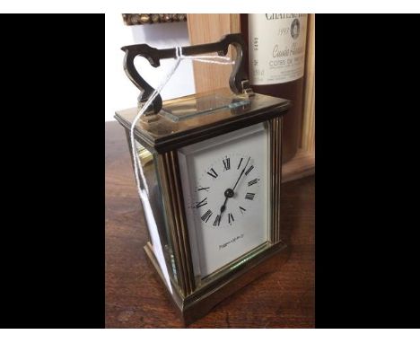 A 12cm high brass cased carriage clock by Mappin &amp; Webb