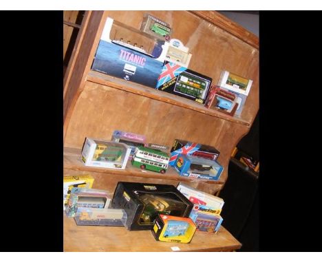 A quantity of boxed die-cast vehicles, including London double decker by Solido.  Also includes boxed model of Titanic 