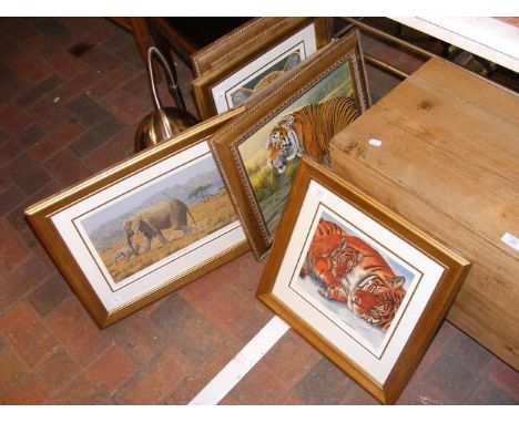 A quantity of framed prints and pictures of Tigers, Elephants and Wolves, etc., together with an 'eyeball' lamp  