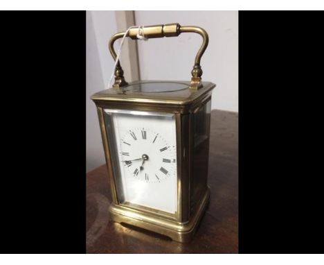 A 14cm high brass cased carriage clock