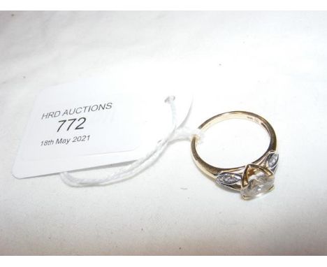 A ladies oval dress ring in 14ct setting