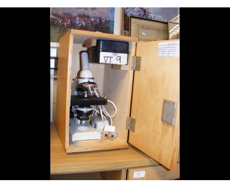 A Lomo Micmed 1 microscope and various lenses - boxed