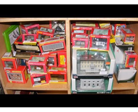 A quantity of Hornby n gauge scale models and buildings, etc. - in two compartments 