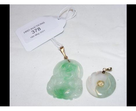 A 4cm carved jade buddha pendant together with a circular mother of pearl and jade pendant