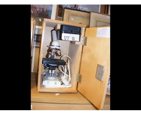 A Lomo Micmed 1 microscope and various lenses - boxed